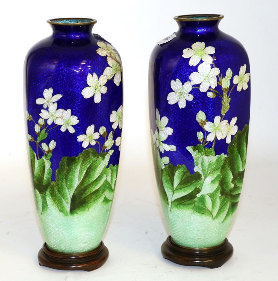 Pair of 20th century Japanese cloisonne vases on turned wooden stands
