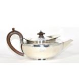A George III silver teapot, John Emes, London 1800, squat circular with everted rim, engraved with a