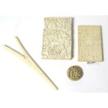 A Cantonese ivory card case; another; a small box; and glove stretchers, all circa 1900
