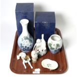 Five pieces of Royal Copenhagen ceramics including two vases, two birds and a pin tray, together