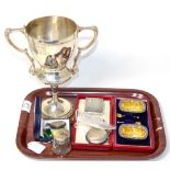 A silver plated trophy cup 'Ipswich Police Sports 1950'; with a cased pair of silver salts and a