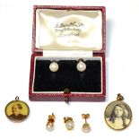 A pearl earrings and pendant suite, the earrings with post fittings, stamped '750'; a pair of