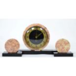 A 1920s/30s pink marble clock garniture