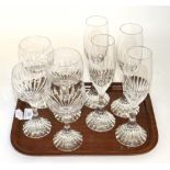 A group of Baccarat Messana pattern crystal table glasses comprising: four champagne flutes and four