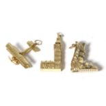 Three large 9 carat gold charms, viz; a ski boot, a biplane and Big Ben (3)18.2g gross. Ski boot 3cm