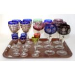 Various coloured drinking glasses