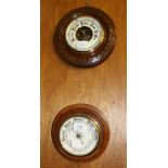 Two oak cased aneroid barometers