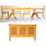 Andrew Conning Tancred; An Oak Butterfly Dining Suite, comprising a twin pillar dining table,