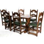 A Reproduction Oak Refectory Style Dining Table, of rectangular form, with standard end supports,