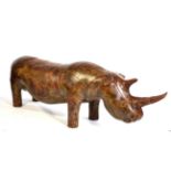 A Mid-20th Century Brown Leather Model of a Rhinoceros, attributed to Omersa and probably retailed