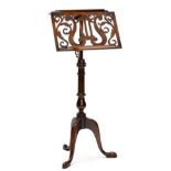 Brights of Nettlebed: A Reproduction Walnut and Mahogany Music Stand, in Victorian style, with an