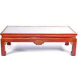 A Red Lacquered and Gilt Decorated Chinese Style Coffee Table, of recent date, the moulded top above