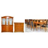 An Eleven Piece Reproduction Fruitwood Dining Suite, comprising a set of eight dining chairs,