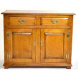 A Reproduction Oak Two-Door Sideboard, by Richard Gill & Sons Ltd, Harrogate, with two frieze