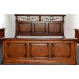 An Havanna 6' Bed Frame, retailed by Barker & Stonehouse, circa 2007, the headboard with scrolled