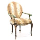 A Faux Leopardskin Armchair, of recent date, with traces of cream and green paint, with padded