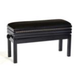 A Reproduction Ebonised Adjustable Duet Music Seat, of recent date, upholstered in black overstuffed