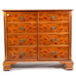 A Reproduction Burr Yewwood and Featherbanded Side Cabinet, with two cupboards with four drawers