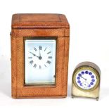 A brass Carriage timepiece with fitted travelling case and a miniature silver cased desk timepiece