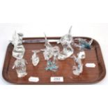 A group of eight Swarovski crystal marine ornaments including Orka, Blue Whale, Dolphin, Sea Horses,