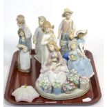Seven Lladro figures and a Lladro figure group