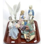 Eight Lladro figures and models including Dove model 4550