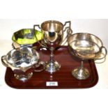 Four various silver trophy cups, early 20th century including Hamilton and Inches examples,