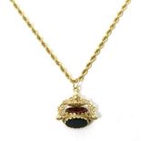 A 9 carat gold hardstone swivel fob on a 9 carat gold rope chain necklace, oval bloodstone, onyx and