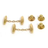 A pair of double torpedo-shaped chain linked cufflinks, stamped '15CT' and a set of three dress
