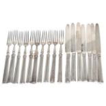 A part set of George III silver fruit knives and forks, the knives Robert Trickett & Co,