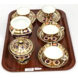 A quantity of Royal Crown Derby Imari pattern ceramics including four cups and saucers, a vase and