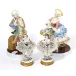 A pair of 18th century style bisque figures of a dandy and flower seller; with two Dresden