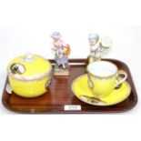Yellow ground porcelain covered sugar basin, similar covered cup and saucer, late Hoechst figure and