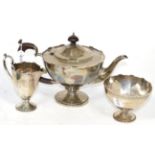 An early 20th century silver three-piece bachelor's teaset, Adie M. Bros, Birmingham, 1921 (3)