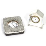 A silver cased desk timepiece and a silver mounted travelling cased timepiece, nickel plated