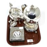 A silver mounted cased travelling timepiece, a silver cream jug and plated wares