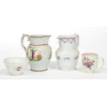 Two 18th century New Hall type jugs, a Worcester floral painted tea cup and a floral and gilt