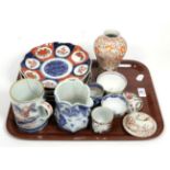 A group of 18th century and later Oriental ceramics including Chinese mug, tea bowls, jug, four