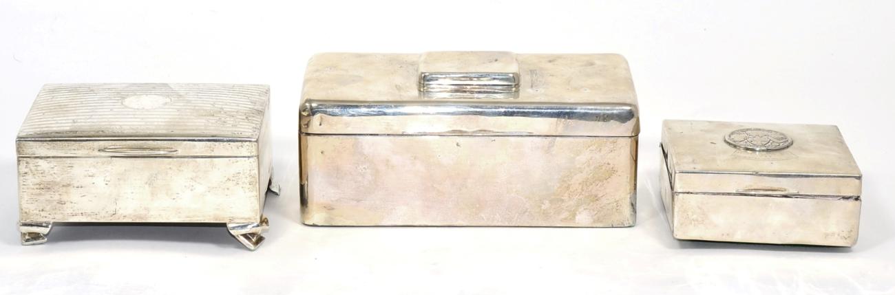 A silver cigarette box with integral vesta case to cover, London 1901; a silver jewellery box,