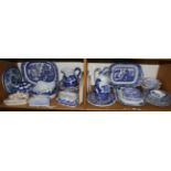 A quantity of blue and white ceramics including meat plates, jugs, plates, etc (two shelves)