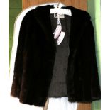 Dark brown mink short jacket, labelled 'Mister Monty Furs', with slit pockets and initials 'M J M'