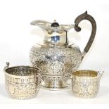 A Victorian composite three-piece silver bachelor's teaset, teapot marks rubbed, retailed by