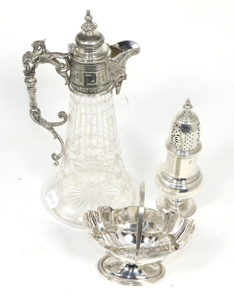 A silver swing handled pedestal sugar basket, Birmingham 1903; a pair of sugar tongs; an 18th