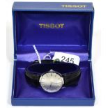 One Tissot watch, boxed