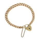 A 9 carat gold curb link bracelet, with a 9 carat gold padlock clasp, length 18cm 17.5g