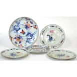 A set of three 19th century Chinese export plates, another similar plate and a 19th century Imari