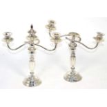 A pair of Danish sterling candelabra, 20th century, (one sconce missing) (2)