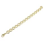 A 9 carat gold fancy hoop link bracelet, length 19.5cm With a lobster claw clasp, 16g