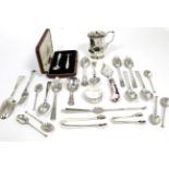A group of silver items, including a baluster Christening mug; a cased pusher and spoon; a set of