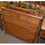 A George III style mahogany chest of drawers, three long drawers with two shorter drawers above